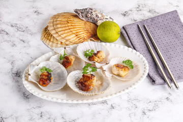 Grilled scallops shell with butter