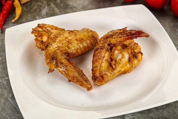 Tasty roasted chicken wing with spices
