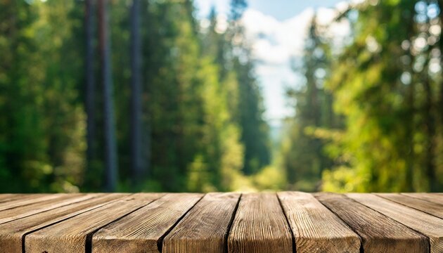 the empty wooden table top with blur background of boreal forest exuberant image