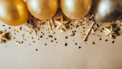 Fotobehang luxury holidays beige background with balloons golden confetti sparkles lights anniversary banner for birthday party topp view flat lay © Richard