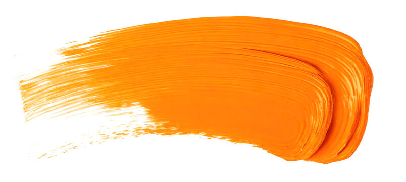 Orange paint brush stroke isolated on white background. Abstract art background