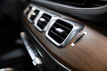 Obraz na płótnie Canvas Luxury car air vents and air conditioning. Modern car