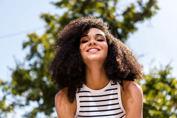 Photo of cheerful glad lovely shiny girl rejoicing sunny spring season nice weekend summer party picnic outside