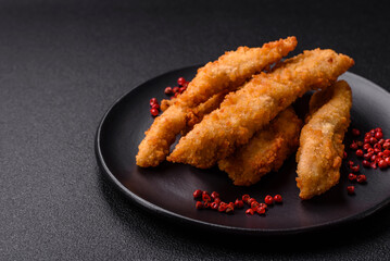 Delicious fresh chicken or turkey strips or nuggets breaded with salt and spices