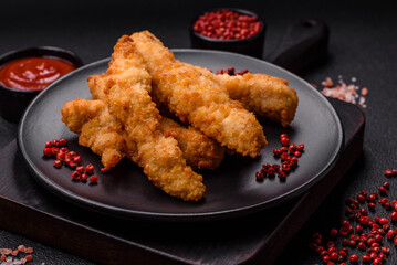 Delicious fresh chicken or turkey strips or nuggets breaded with salt and spices