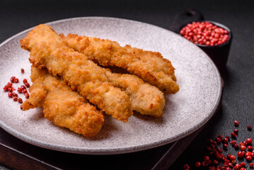 Delicious fresh chicken or turkey strips or nuggets breaded with salt and spices