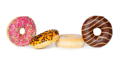 A stack of fresh decorated donuts on a white background