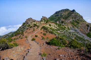 Fototapeta na wymiar Paved footpath of the PR 1.2 trail climbing to the Pico Ruivo, the highest mountain peak on Madeira island (Portugal) in the Atlantic Ocean