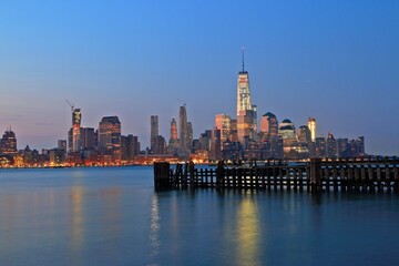 Fototapeta na wymiar Downtown of lower Manhattan of Hudson river of beautiful sence of New York city with lower Manhattan in dusk evening.