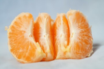 A peeled orange with the top cut off