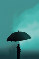 A man is standing under an umbrella in the rain