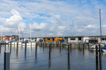 Spakenburg, the Netherlands. 25 February 2024. A harbor with houseboats equipped with solar panels...