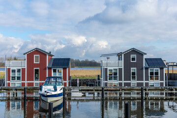Spakenburg, the Netherlands. 25 February 2024. A harbor with houseboats equipped with solar panels...