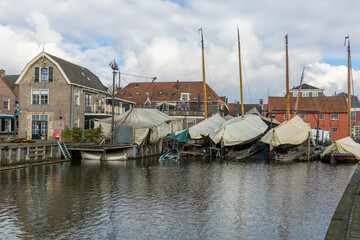 Spakenburg, the Netherlands. 25 February 2024. Harbor in Spakenburg with boats on the dock. The...