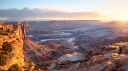 A sunset over a canyon landscape