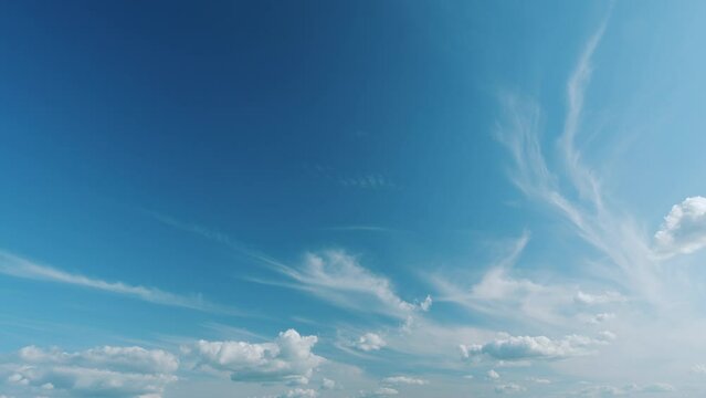 Clouds With Blue Light Blue Sky In Horizon. Cloudscape Nature Background Texture. Fluffy Layered Clouds Sky Atmosphere.