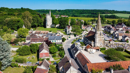 Church Saint AndrÃ© of Septmonts in Aisne, Picardie, France - Gothic flamboyant religious building with a bell tower lined with hooks and crowned with a stone spire