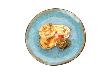 breakfast with egg, cucumbers and cheesecakes on a plate, transparent background, cut out