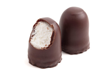 Dark Chocolate Covered Marhsmallows with a Waffer Base Known as Chocolate Kisses or Schokokuss Isolated on a White Background
