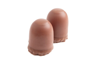 Milk Chocolate Covered Marhsmallows with a Waffer Base Known as Chocolate Kisses or Schokokuss Isolated on a White Background