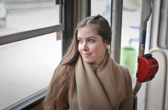 portrait of a young woman in a  tram
