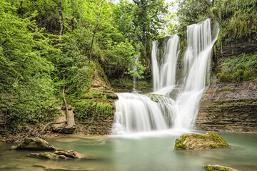 Fototapeta na wymiar Enchanting Forest Waterfall