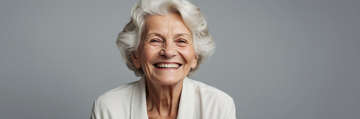 Obraz na płótnie Canvas Happy smiling elderly white woman.