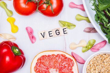 The word vege in a flat lay photo alongside vegan food