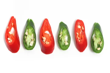 Foto op Plexiglas Hete pepers Close-up sliced red and green hot chili pepper top view isolated on white background clipping path