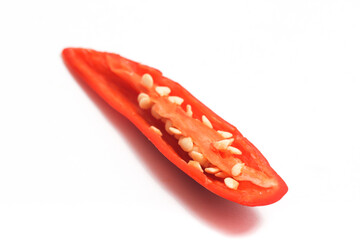 Half sliced red hot chili pepper isolated on white background clipping path