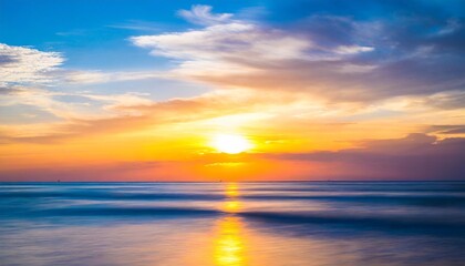 beautiful blurred defocused sunset sky and ocean nature background
