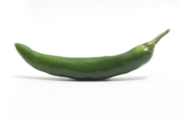 Green hot chili pepper side view isolated on white background clipping path