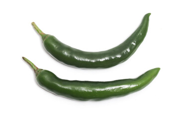 Two green hot chili pepper top view isolated on white background clipping path