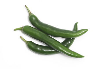 Three green hot chili pepper top view isolated on white background clipping path