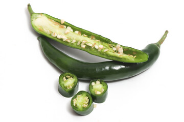 Half sliced green hot chili pepper top view isolated on white background clipping path