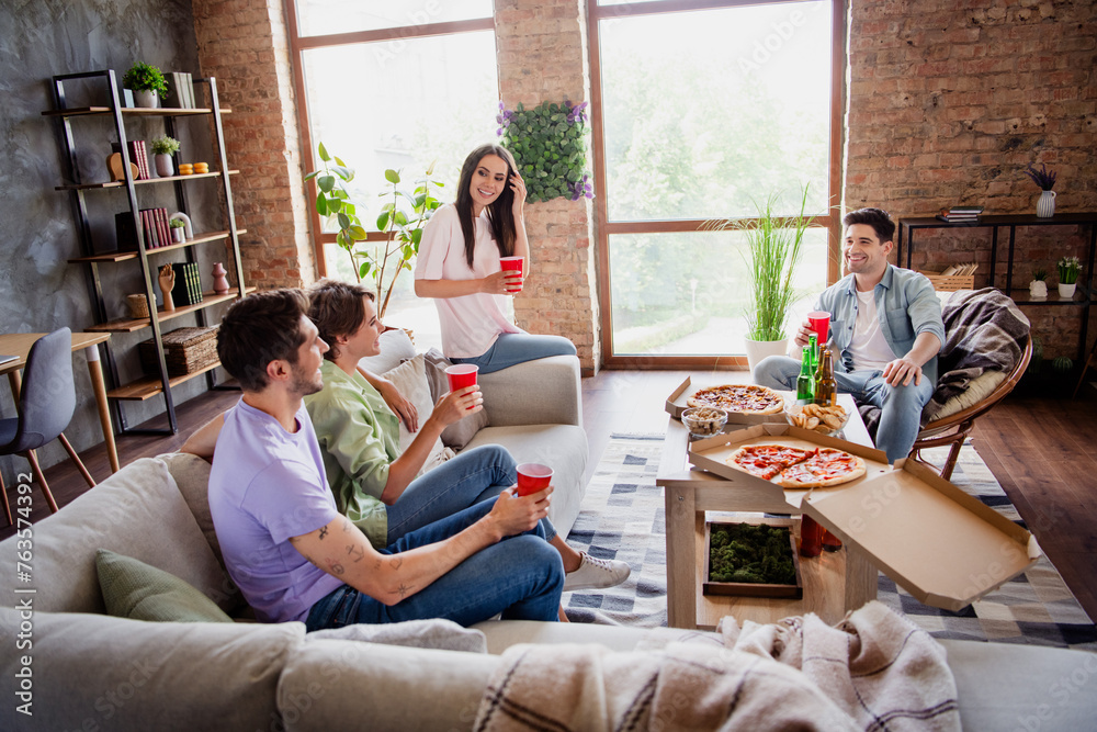 Canvas Prints Full size photo of peaceful cheerful buddies sit couch armchair communicate drink beer eat pizza spacious flat indoors