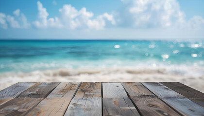 Naklejka na ściany i meble Wood table top on blurred blue sea and white sand beach background