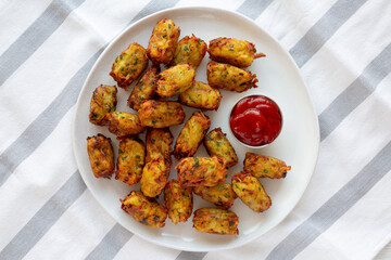 Homemade Fried Tater Tots on a Plate, top view. Flat lay, overhead, from above.