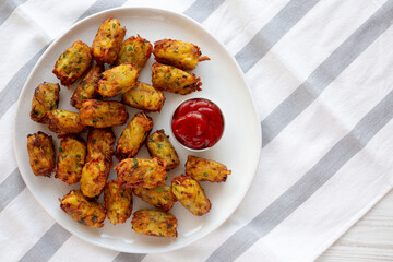 Homemade Fried Tater Tots on a Plate, top view. Copy space.