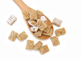 Breakfast setting with frosted wheat cereal on white background  - 763576569