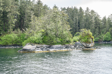 Strangely shaped Islands in Sitka Sound with mountains behind, Alaska, USA