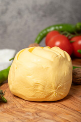 Cow butter. Organic butter on wood serving board. Close up