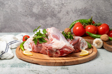 Veal shank. Raw beef shank on wood serving board