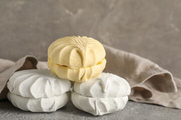 Sweet zefirs on grey background