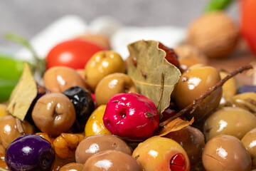 Mixed olives. Special mixed olives prepared with various olives on a wooden serving board. Close up