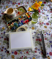 still life with paints and brushes