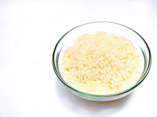 a bowl of white rice isolated on white background
