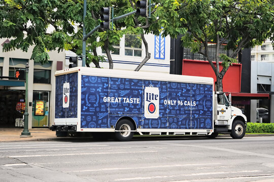 Honolulu, HI - Jan. 12, 2024: Miller Lite brand beer, Molson Coors owned Miller Brewing Company delivery truck on city street stocking local store. 
