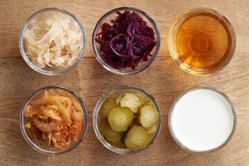 Fermented foods and vegetables - kimchi, white and purple sauerkraut, apple cider vinegar, kefir...