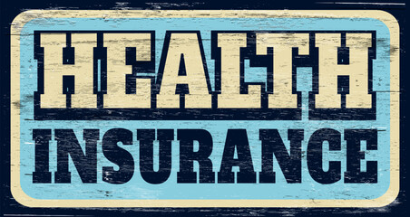 Aged and worn health insurance sign on wood - 763602321